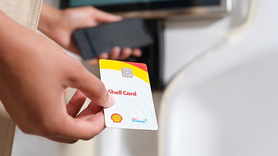 Shell card in hand